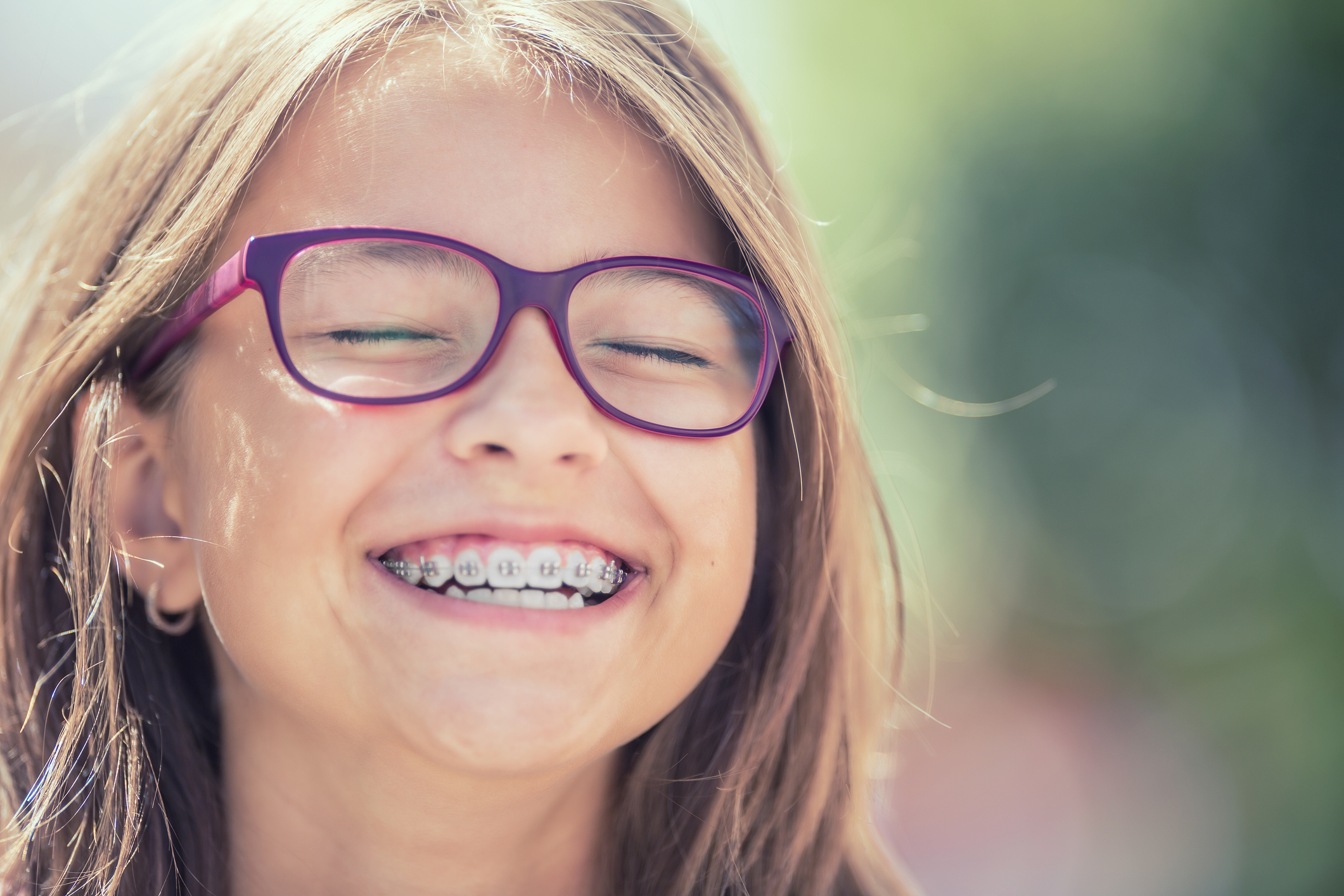 Happy girl with braces